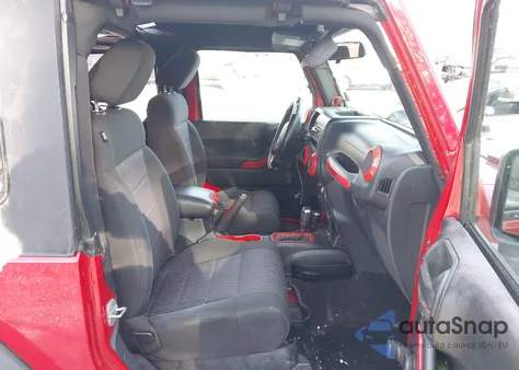 2011 Jeep Wrangler Sport z USA, uszkodzony, nr VIN 1J4GA2D13BL511790